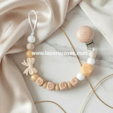 Attache tetine pour bébé de couleur or crème et blanche