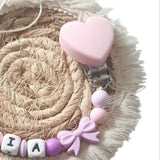 attache tétine rose et lilas pour bébé