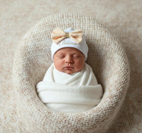 Bonnet bebe coton blanc avec nœud couleur Saumon.