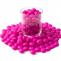 perle en silicone plate 12 mm couleur rose fushia présenter 