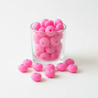 perle en silicone plate 12 mm couleur rose