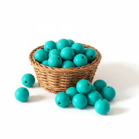 perle ronde en silicone 12mm de couleur vert turquoise pour création attache tétine et anneau dentition