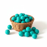 perle ronde en silicone 12mm de couleur vert turquoise pour création attache tétine et anneau dentition