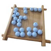 perle ronde en silicone de couleur bleu ciel pour confection attache tétine 