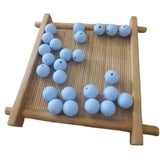 perle ronde en silicone de couleur bleu ciel pour confection attache tétine 