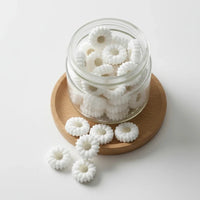 perle en silicone marguerite blanche de 20 mm pour confection attache tétine, créativité DIY.