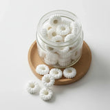 perle en silicone marguerite blanche de 20 mm pour confection attache tétine, créativité DIY.