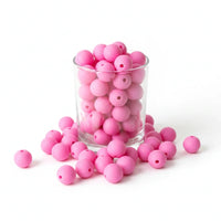perle silicone  rose 12 mm présenter dans un verre transparent