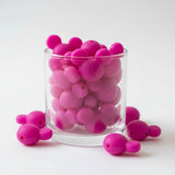 perle  silicone forme tête disney en couleur fushia