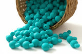 perle en silicone en forme tete mickey en couleur turquoise